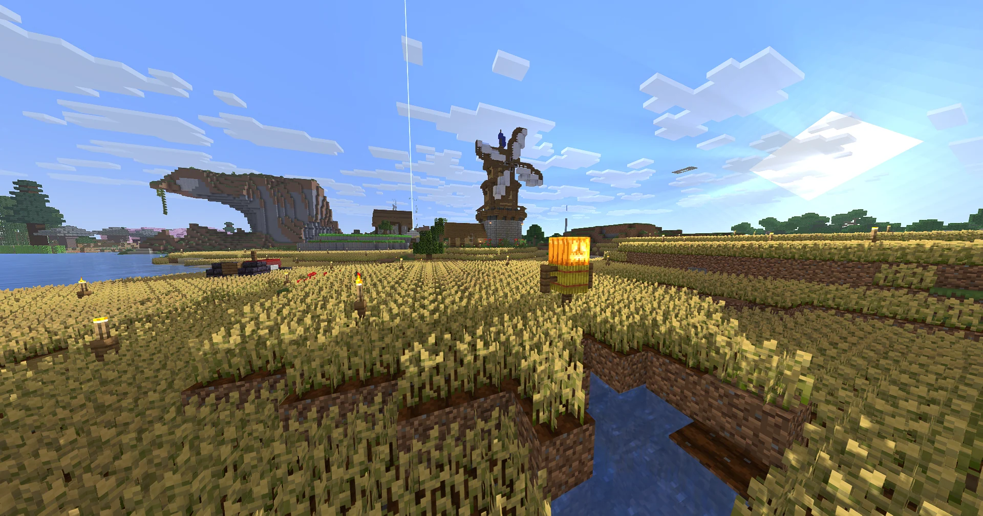 Een windmolen tussen de graanvelden in de MolenCraft survivalwereld